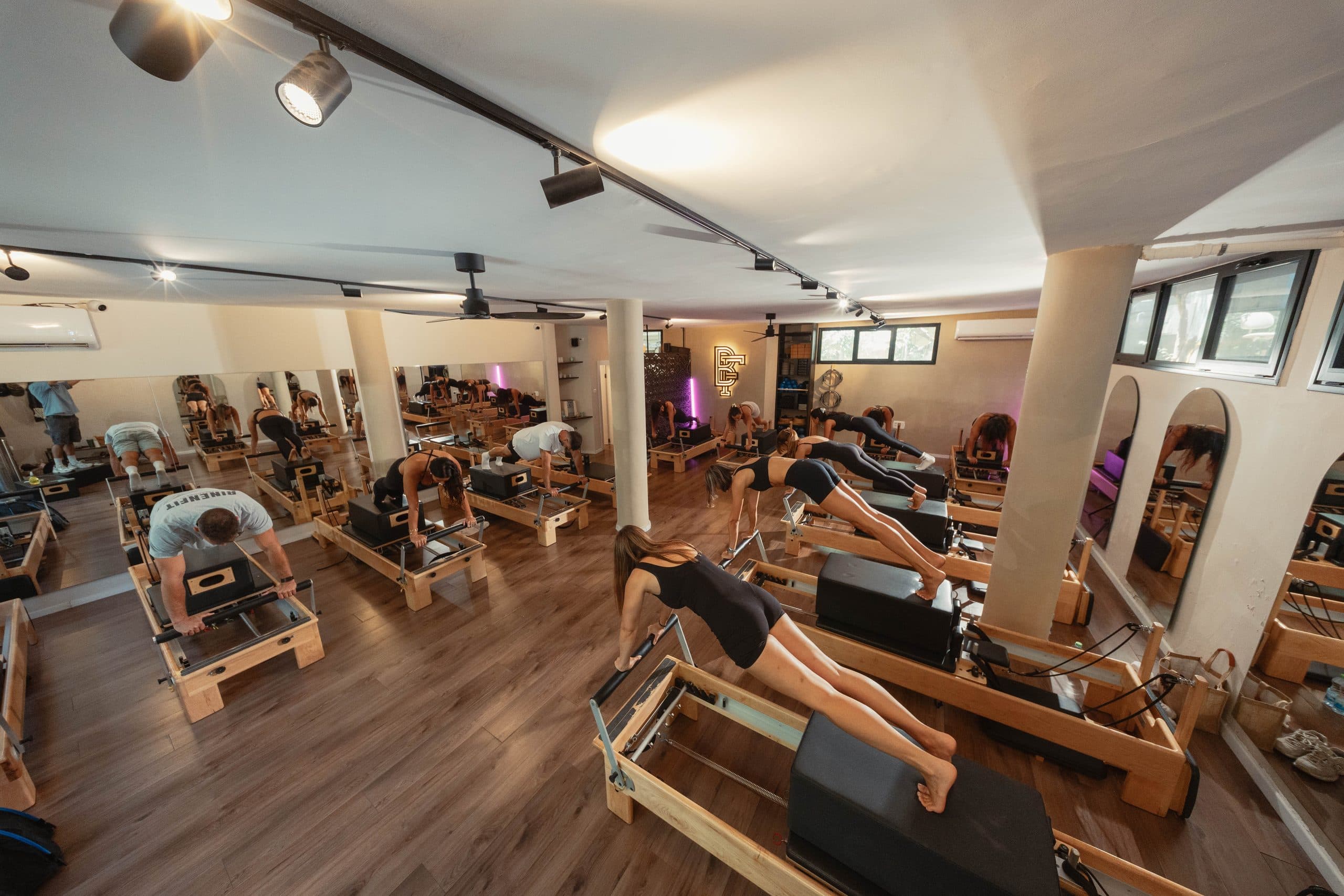 A reformer class in BINENFIT's pilates space at Bograshov 27